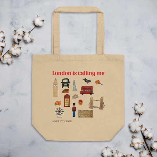 Beige organic cotton tote featuring red London bus, Big Ben, Tower Bridge, tea, and more with “London is calling me” in red font.
