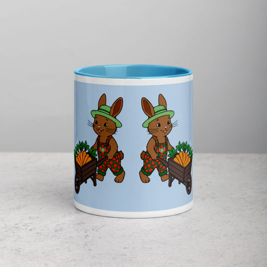Mug with cartoon bunnies design on a light gray background