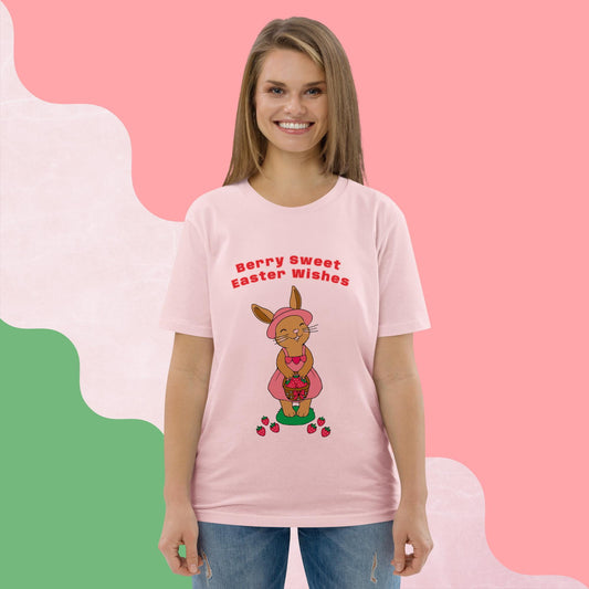 Woman wearing a pink t-shirt with Easter design and text against a colorful background
