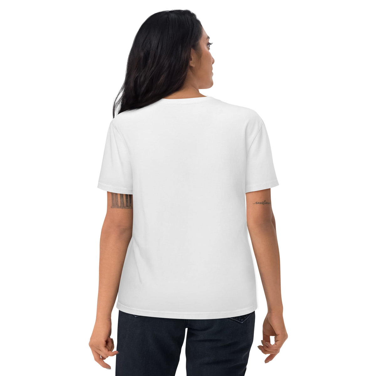 Person wearing a white t-shirt with no graphics and text on the back
