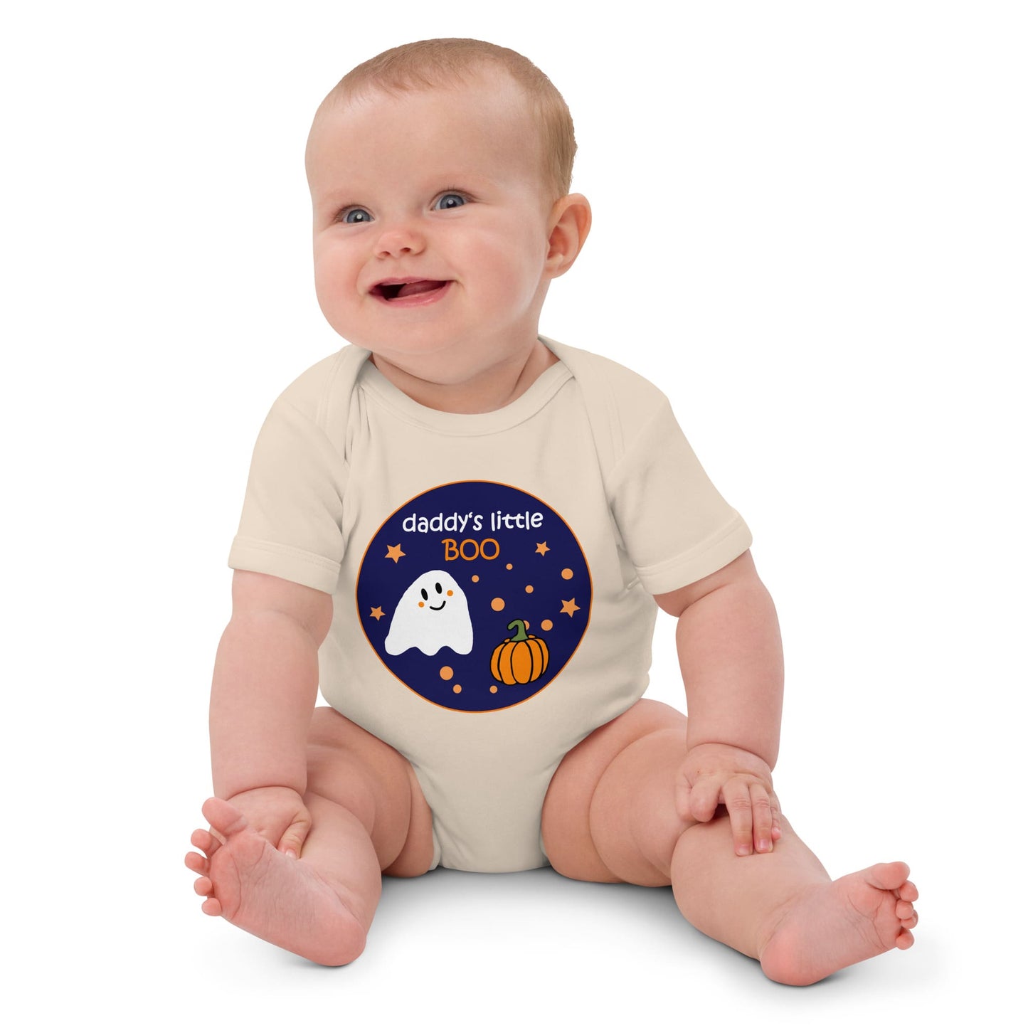 Baby girl wearing a natural color organic cotton bodysuit with Halloween-themed "Daddy's Little BOO" print, featuring a ghost and pumpkin design.