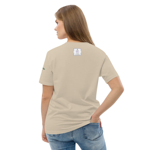 Back view of a woman's eco-friendly t-shirt in a desert dust color with the Anke Wonder logo.