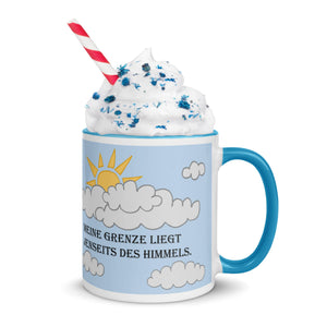 Right side view of blue ceramic mug with the German inspirational quote 'Meine Grenze liegt jenseits des Himmels,' featuring a blue handle and rim.