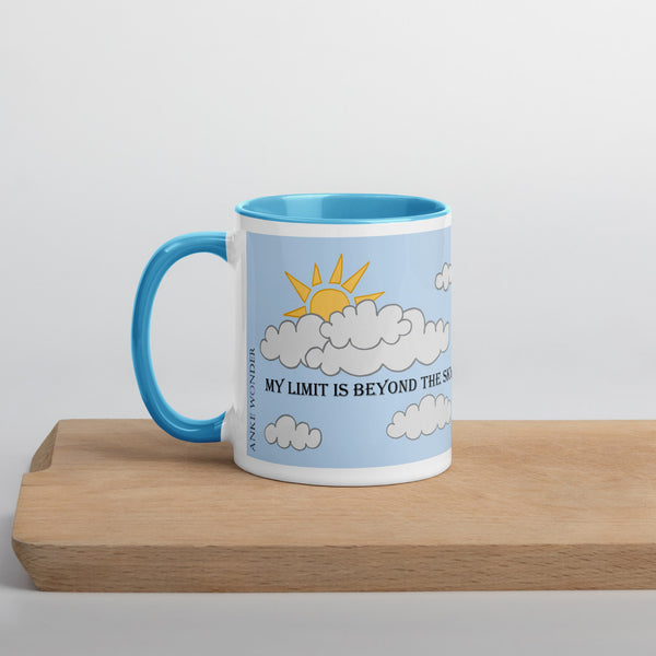 Left side of blue ceramic mug with Anke Wonder logo and motivational quote 'My Limit is Beyond the Sky,' with a blue handle and interior.