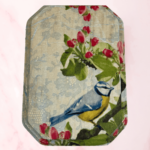 Front View of Handmade wooden wall art featuring a blue tit bird and red flowers on a branch - made by Anke Wonder.