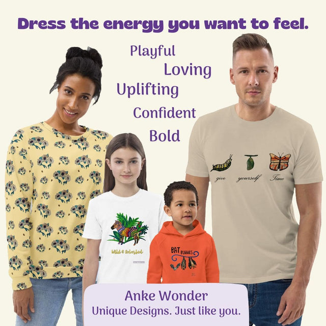 Family wearing clothing with unique designs by Anke Wonder, featuring text about energy and confidence.