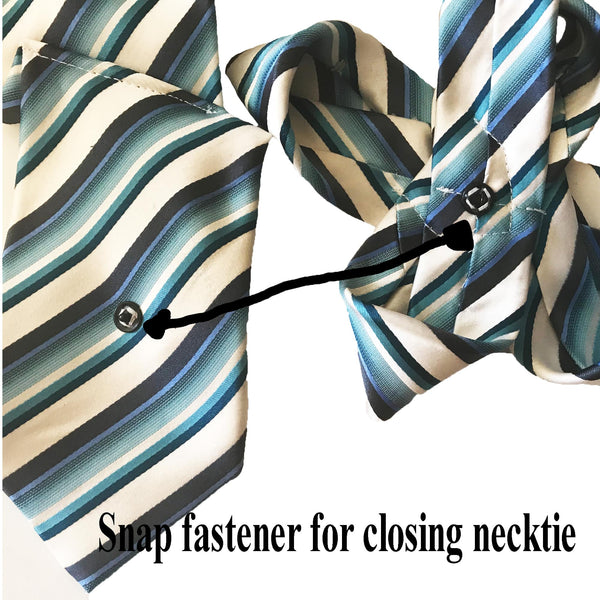 Close-up view of the snap fastener on handmade blue and white striped silk necktie.