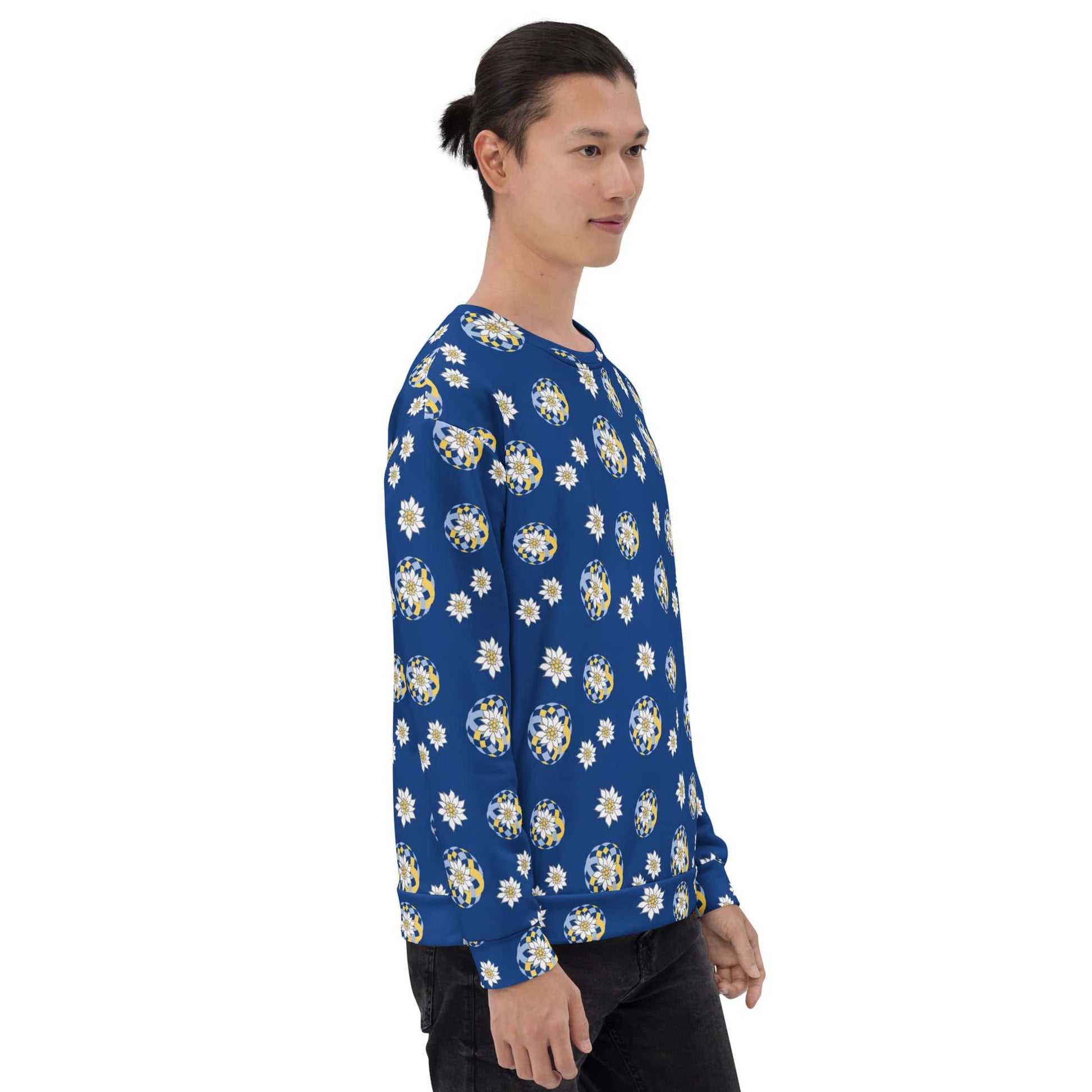 Man wearing a blue floral patterned sweatshirt with Edelweiss Design on a white background