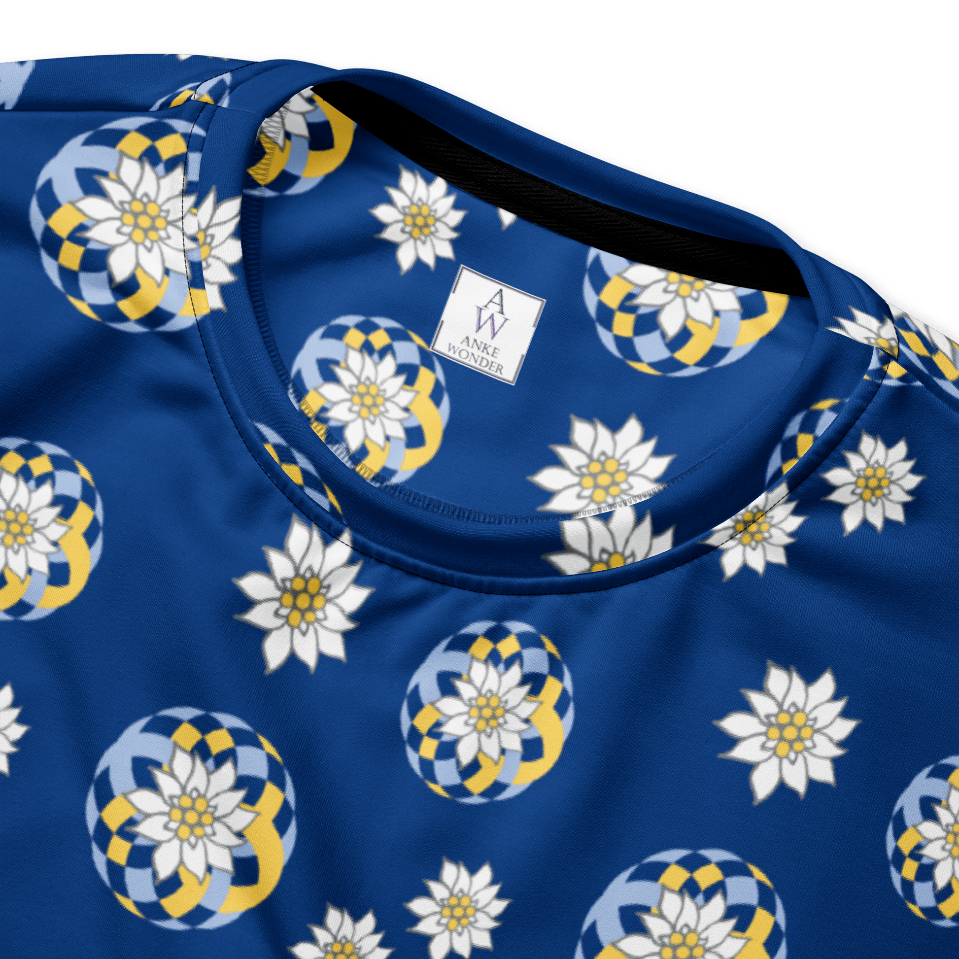 Close-up of blue sweatshirt neckline with floral pattern of Edelweß and the Anke Wonder brand label.