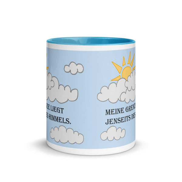 Front view of blue ceramic mug featuring the German motivational quote 'Meine Grenze liegt jenseits des Himmels,' designed to inspire limitless potential.