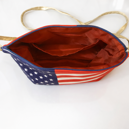 Handbag with American flag design on a white background