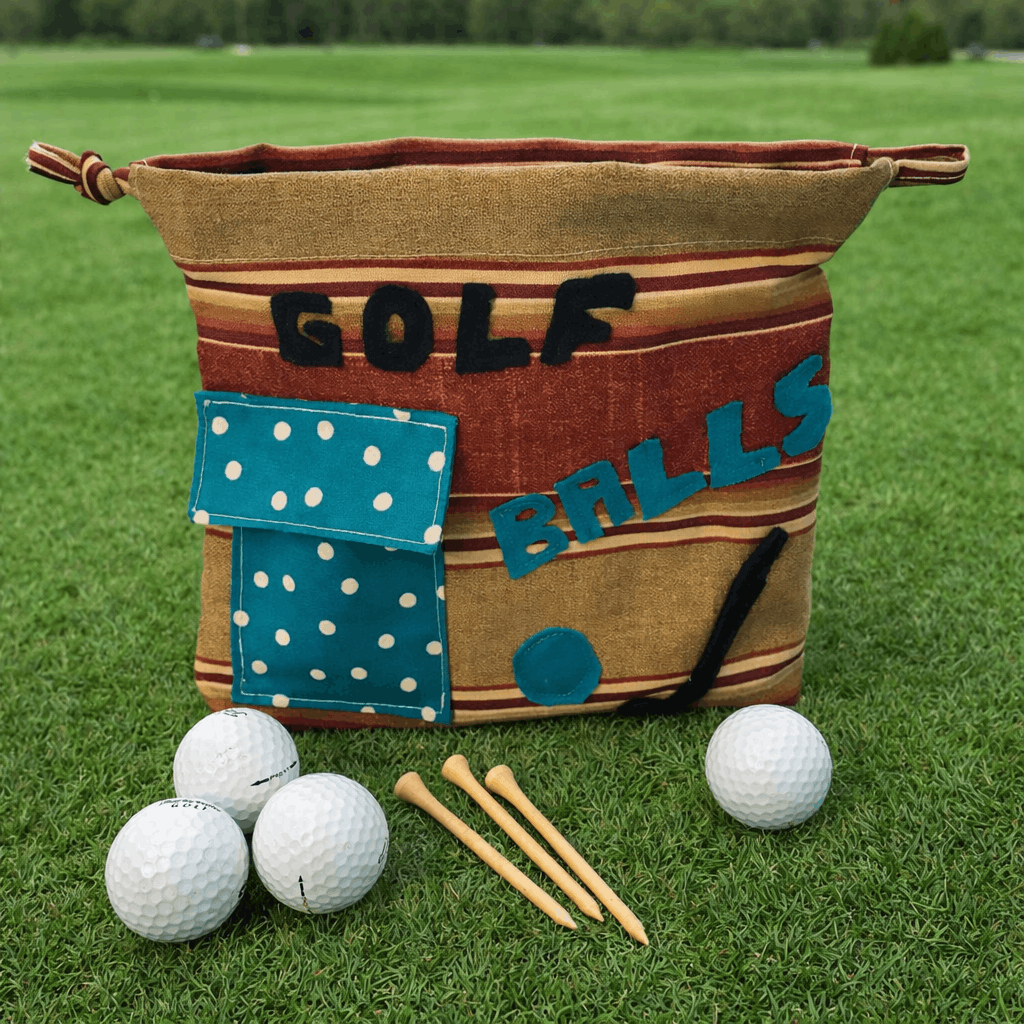 Golf ball bag with 'GOLF BALLS' text on a grassy background