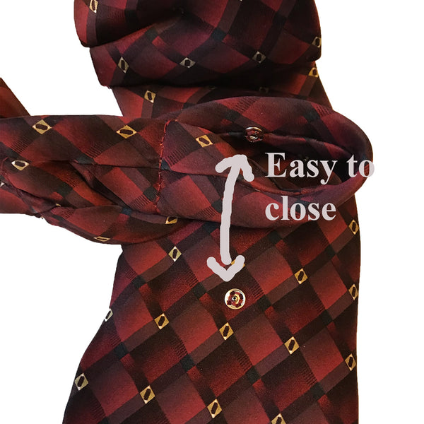 Closeup of the hidden snap fastener on the back of the necktie, demonstrating the easy closure.