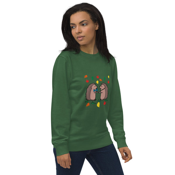 Side view of model wearing green Hedgehog Hugs Organic Cotton Women Sweatshirt, showcasing the soft, organic cotton fabric and cozy fit.