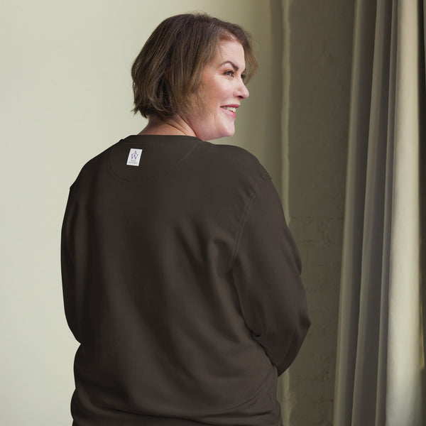 Back view of model wearing the brown Hedgehog Hugs Organic Cotton Women Sweatshirt, showing the Anke Wonder label on the neck.