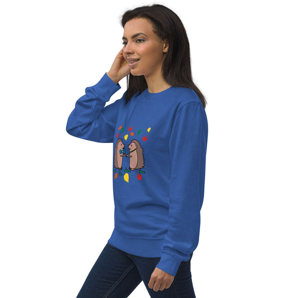 Side view of model wearing blue Hedgehog Hugs Organic Cotton Women Sweatshirt, showcasing the soft, organic cotton fabric and cozy fit.