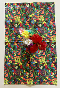 Organic cotton sateen tablecloth with a colorful floral print.