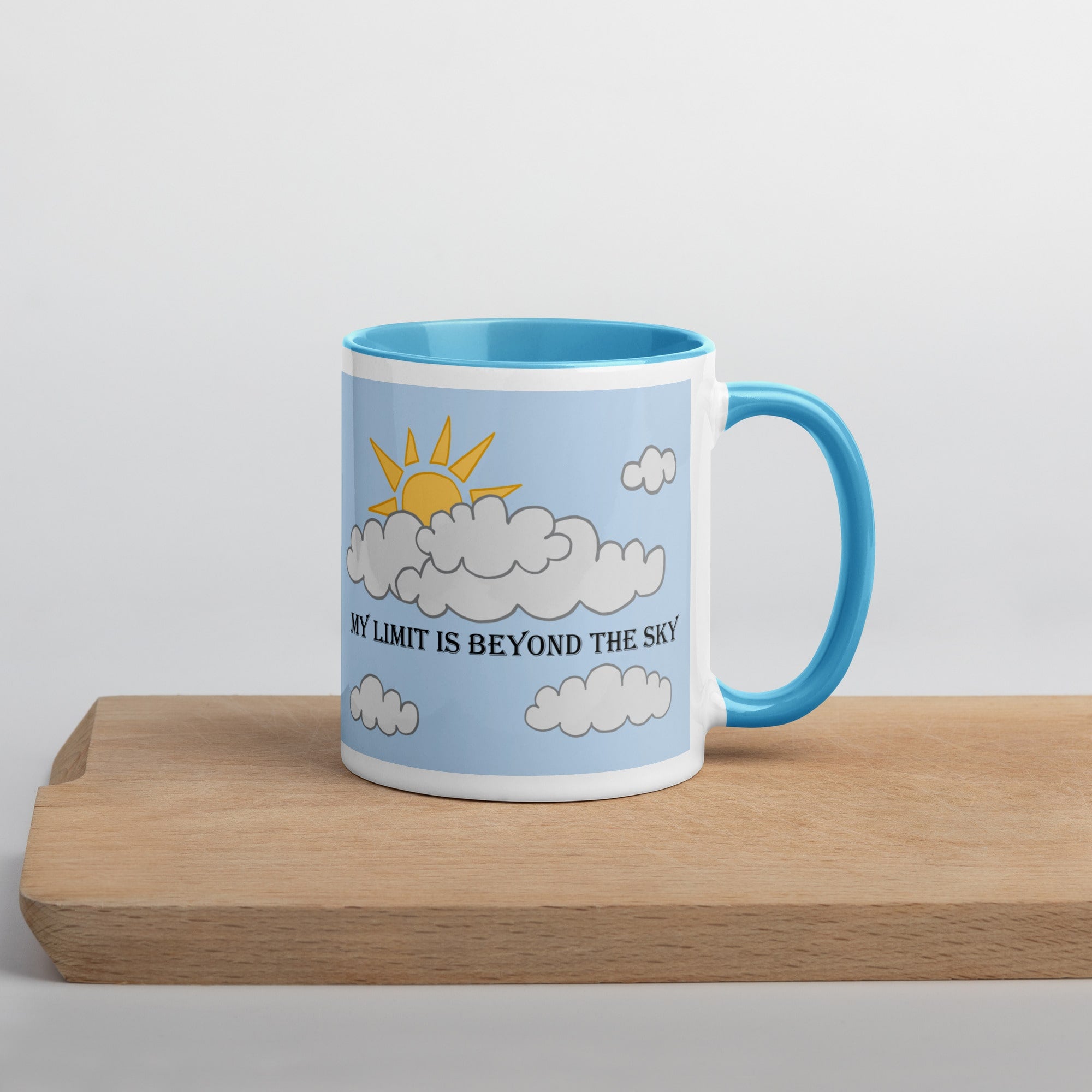 Right side view of blue ceramic mug with inspirational quote 'My Limit is Beyond the Sky,' featuring a blue handle and rim.