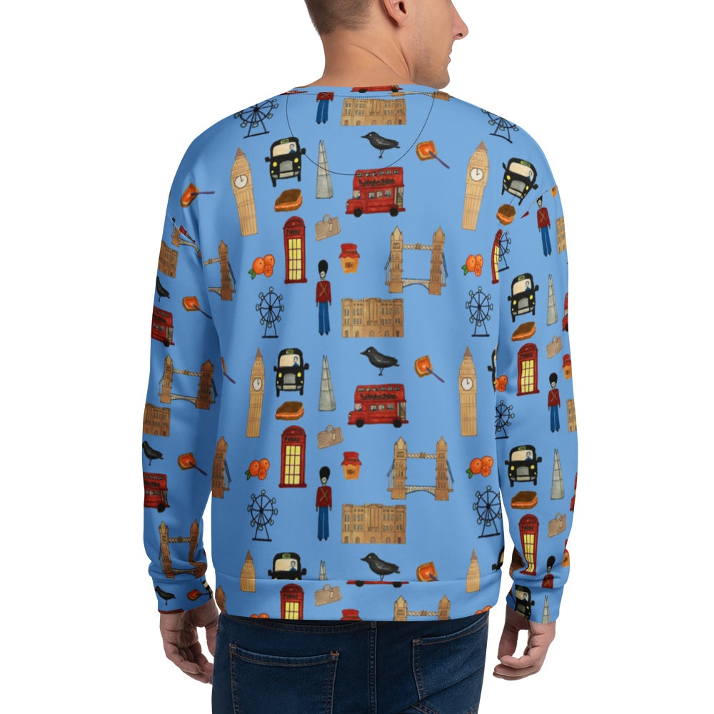 A full back view of the London-themed men’s sweatshirt, displaying the seamless, all-over print of London’s famous landmarks and cultural icons on a vibrant blue background. The sweatshirt has a relaxed, comfortable fit.
