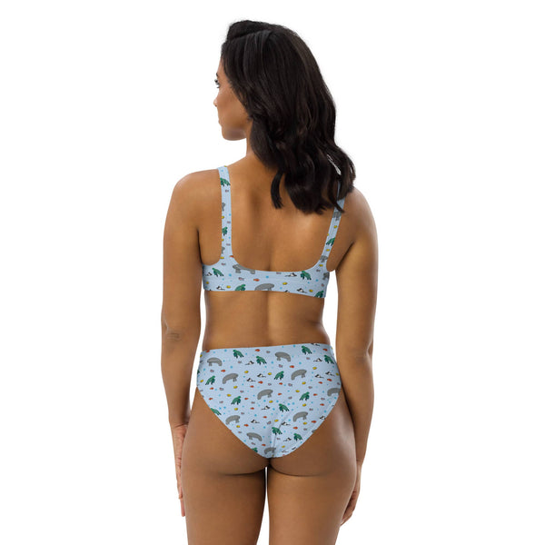 The back of a high-waisted bikini featuring a playful manatee and turtle print, showing full coverage, a secure fit, and eco-friendly craftsmanship.