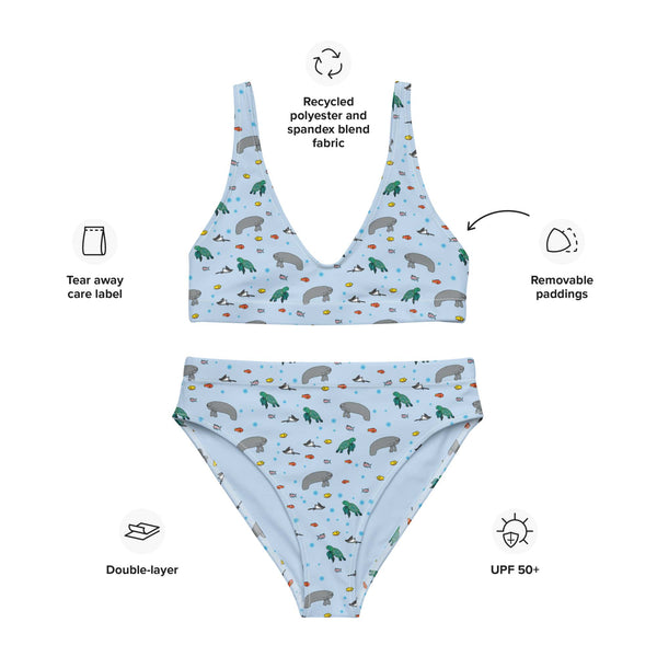 A flat lay of a high-waisted bikini with a manatee and turtle print, highlighting the soft, double-layered fabric, UPF 50+ protection, and quality stitching.