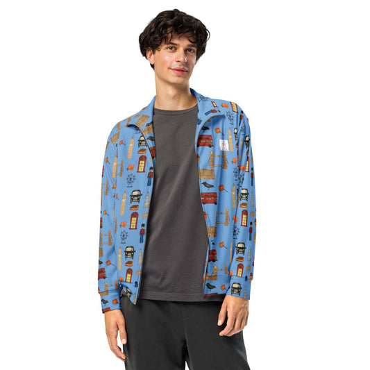 Man wearing a stylish blue track jacket with iconic London-themed illustrations on the sleeves and chest, shown from the front to highlight fit and design.