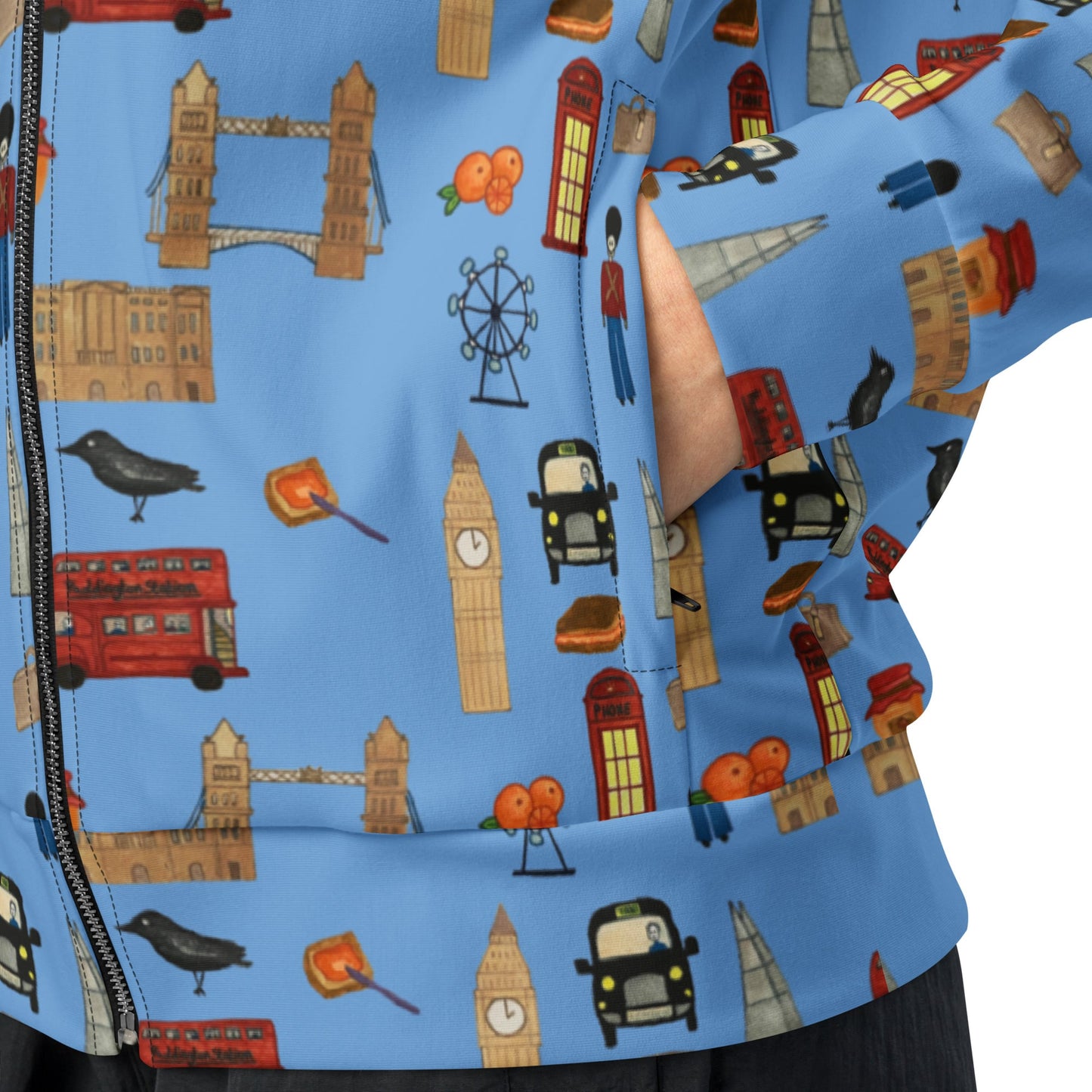 Zoomed-in view of the zippered side pocket on the men’s eco track jacket, displaying the smooth zipper design and durable stitching on the black fabric.