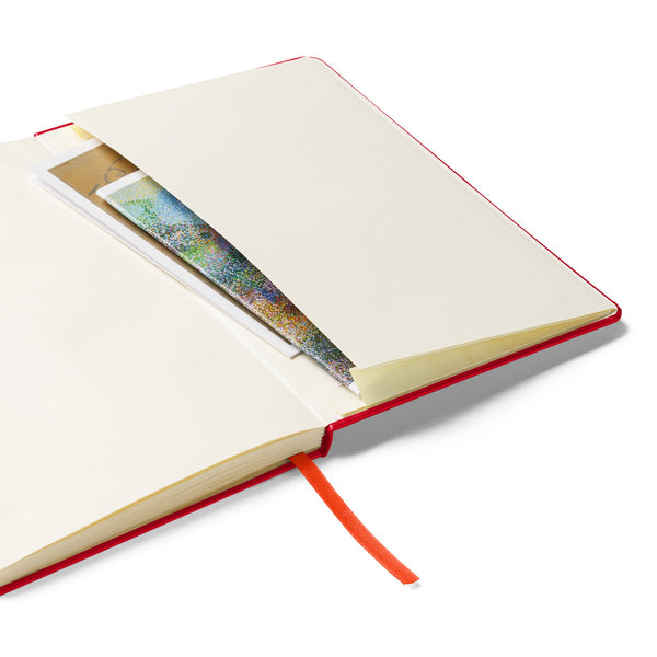 Open view of a red notebook featuring a bunny holding a rose on the cover, showing an expandable inner pocket for storing notes or photos.