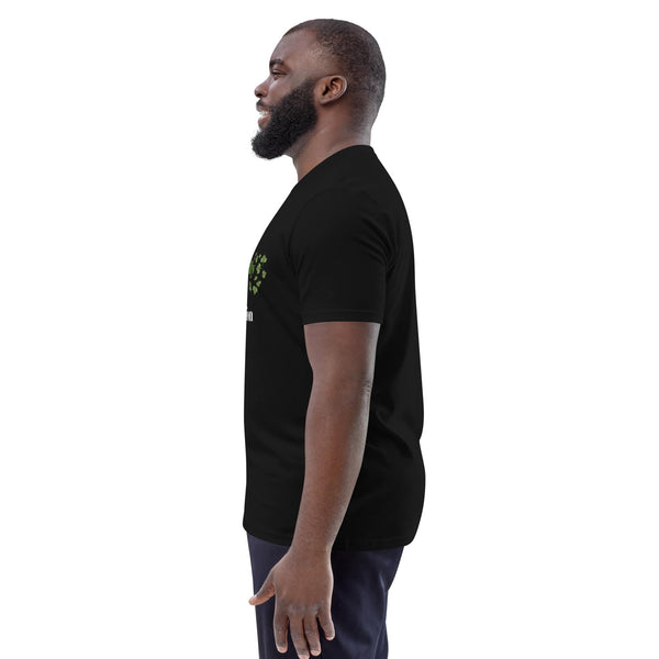 Side view of black organic cotton men's T-shirt featuring the Anke Wonder design Eco-friendly over Fast Fashion.