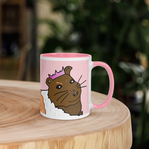 Right side view of pink ceramic mug featuring a guinea pig with a crown, with handle on the right side, perfect for pet lovers.