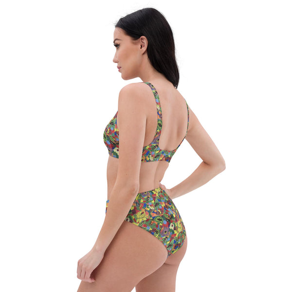 Side view of a recycled high-waisted bikini featuring vibrant hand-painted butterfly and flower designs, highlighting the comfortable fit and eco-friendly materials.