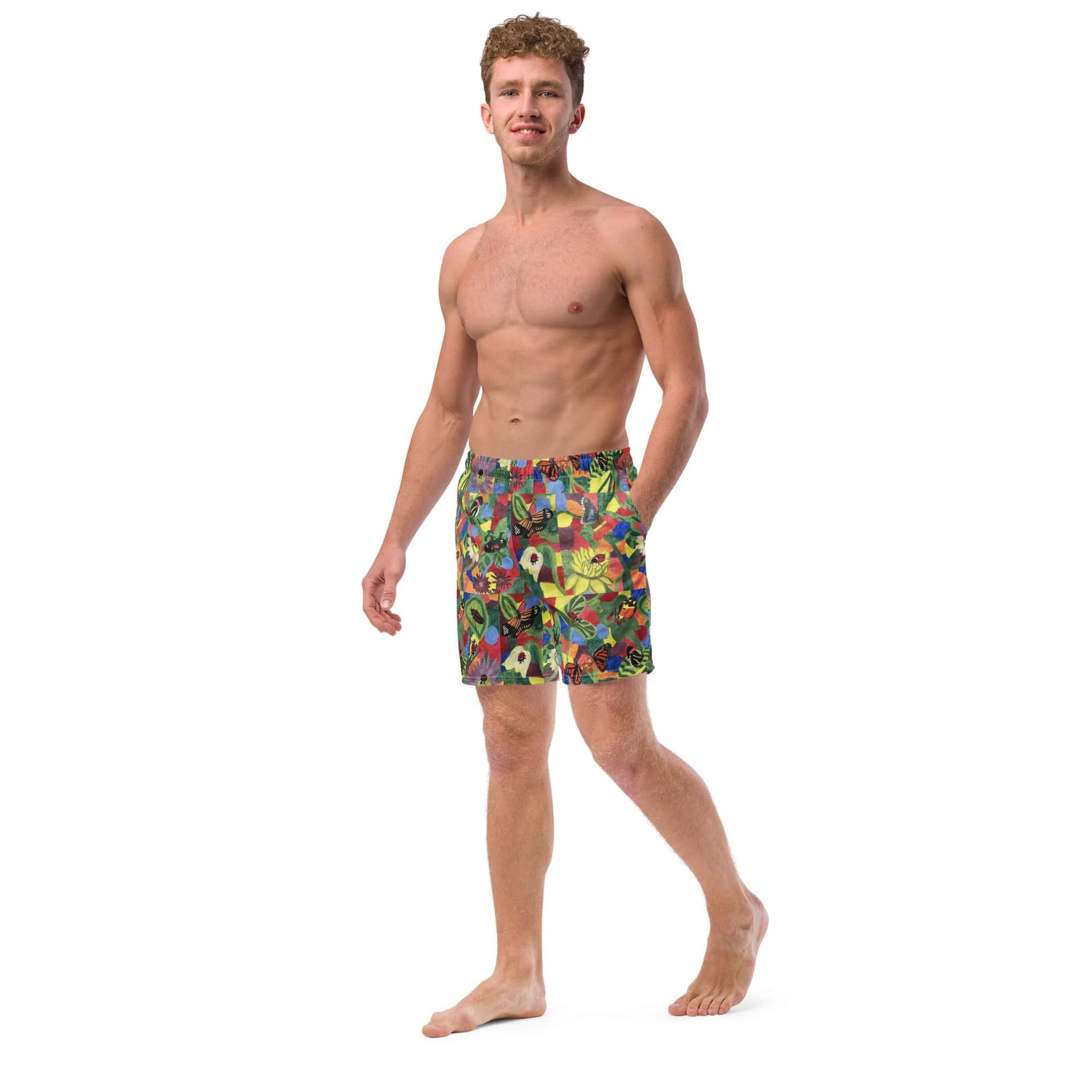 Left-side view of men’s swim trunks featuring a colorful, floral butterfly and ladybug design.