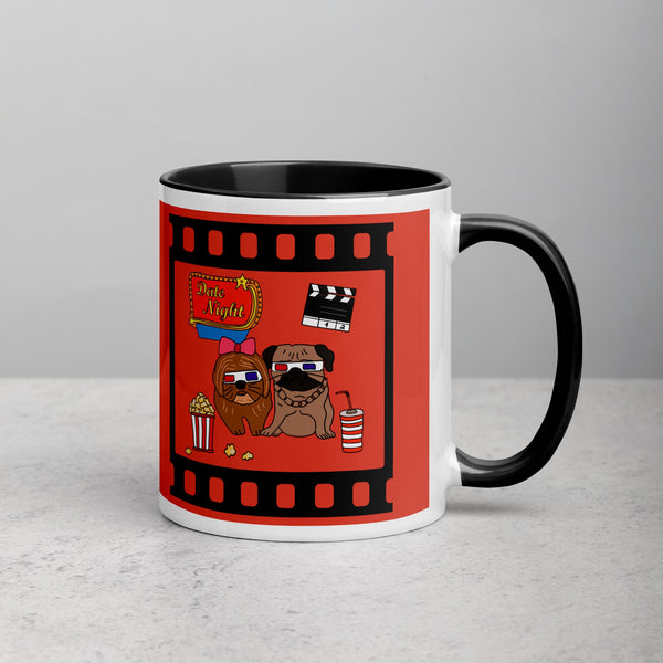 Right side view of ceramic mug with black rim and handle, showing two pugs on a date night with a red theater-themed background, designed by Anke Wonder.