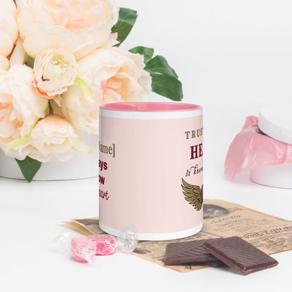 Pink mug with text and design, flowers, and chocolate on a white background