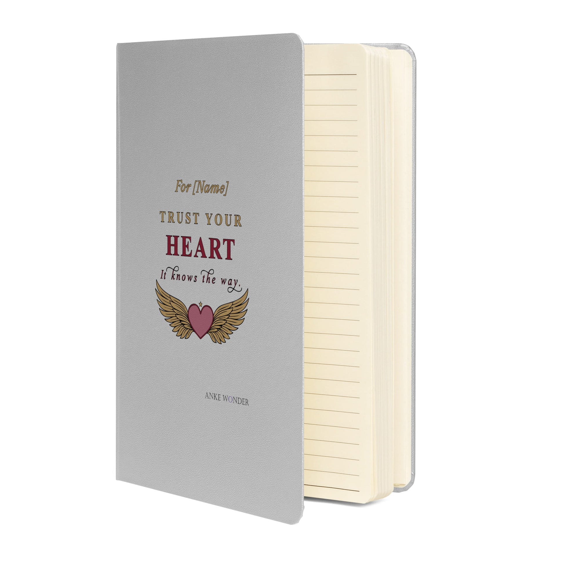 Notebook with motivational quote on a white background