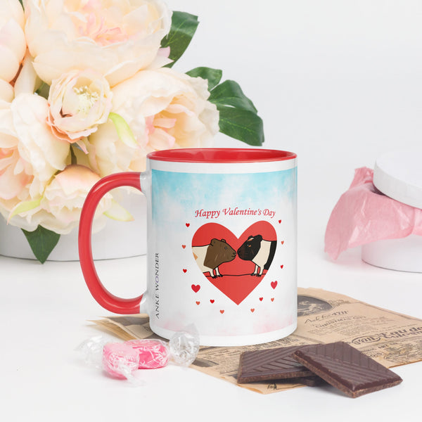 A left view of the mug’s main design, displaying two adorable guinea pigs facing each other inside a red heart with scattered small hearts. Above them, "Happy Valentine's Day" is written in a romantic font on a soft blue and pink watercolor background.