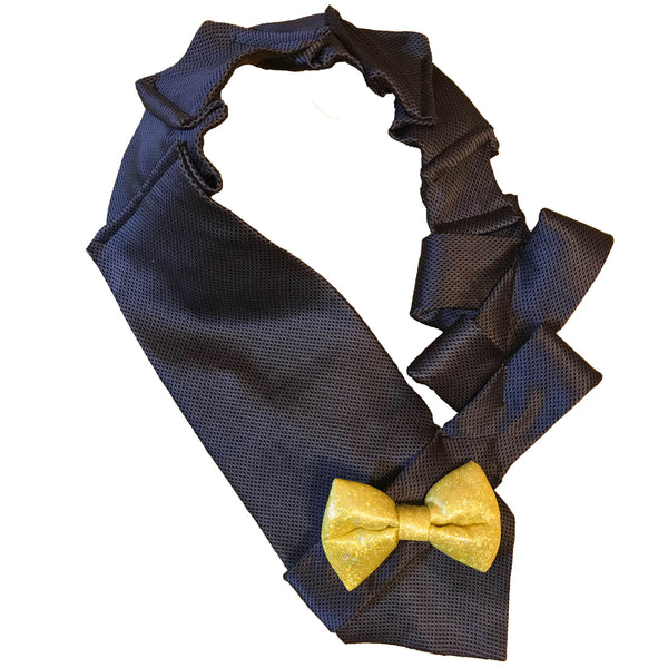 Handmade blue silk necktie with a gold bow displayed flat on a table, showcasing the front design.