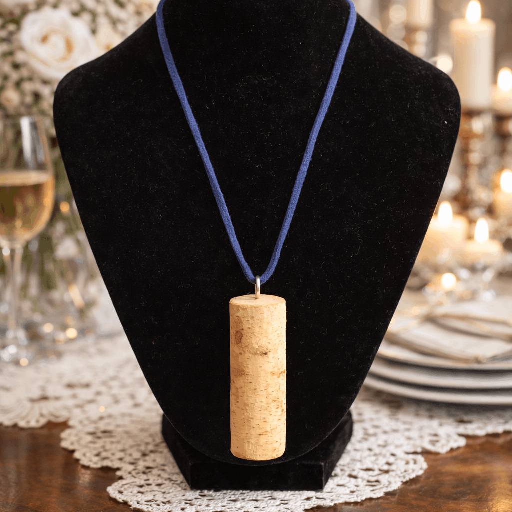 Wooden pendant necklace on a black velvet stand with a festive background