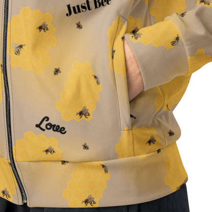 Close-up of front zipper and side pocket of women's bee design track jacket with honeycomb by Anke Wonder.
