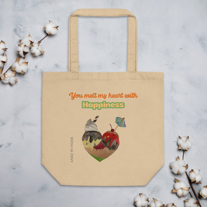 Beige tote bag with a hand-painted ice cream forming a heart, sun umbrella and waffle detail, plus sweet typography in pink/red tones.