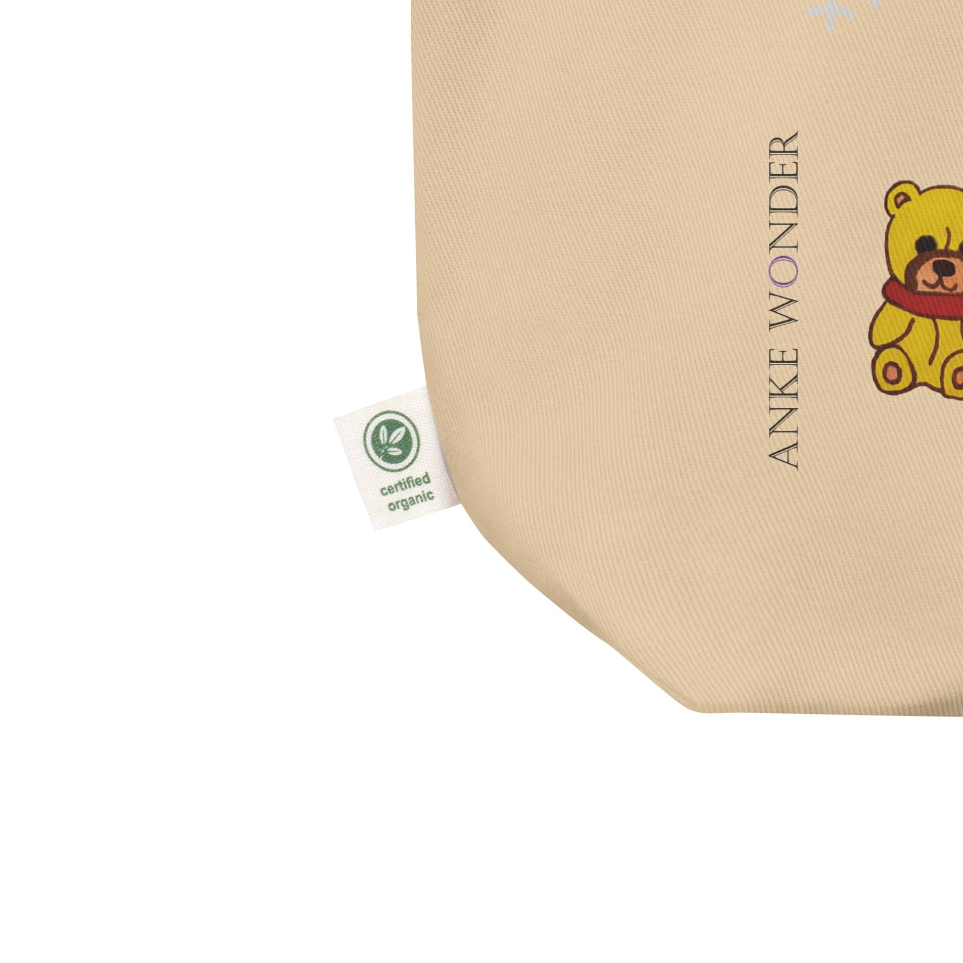 Beige product with 'Anke Wonder' branding and a bear toy illustration on a white background