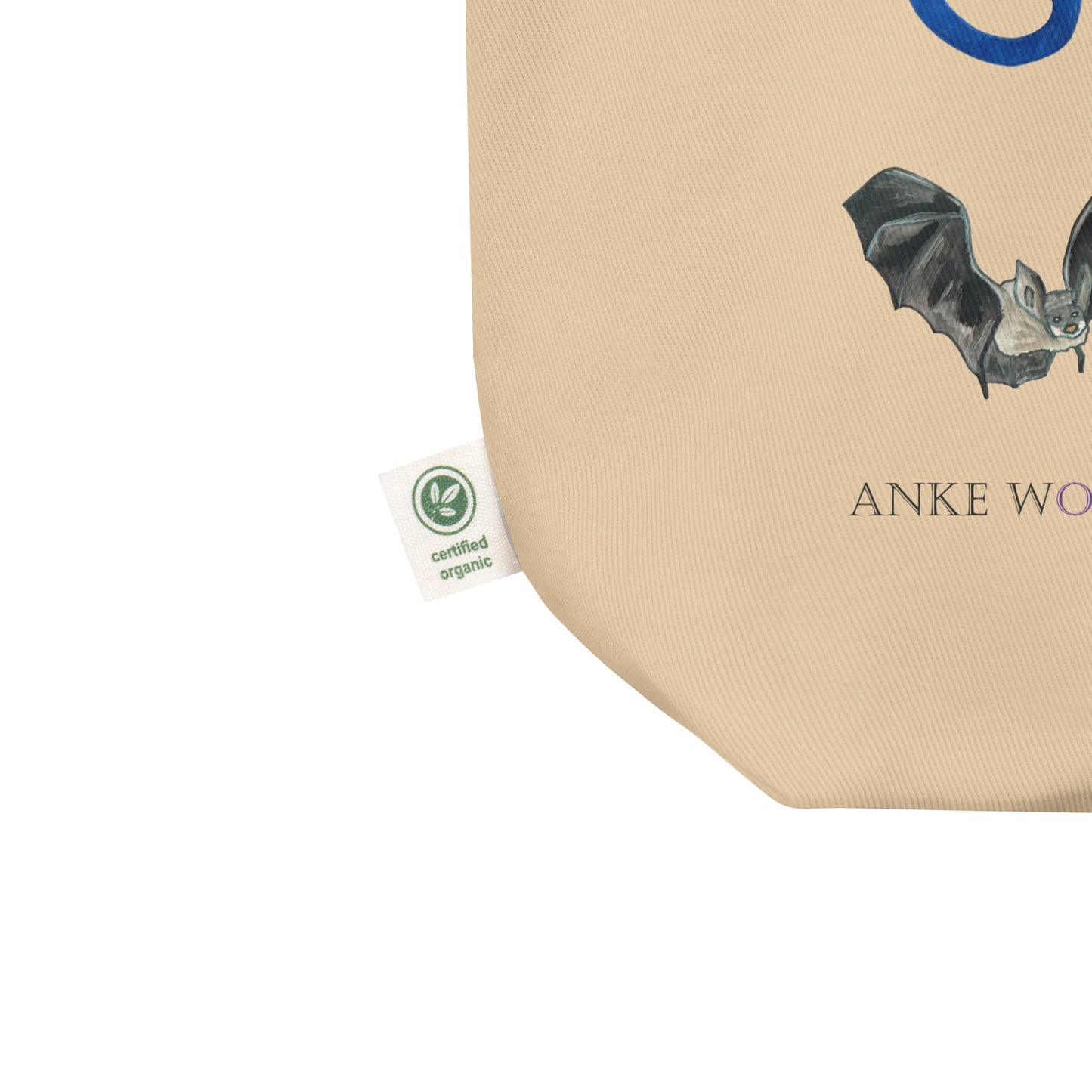 Beige product with a bat illustration and 'Anke Wonder' branding, featuring a organic certification label.