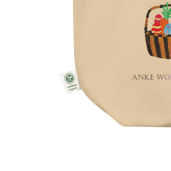 A detailed close-up shot of Easter Tote Bag showcasing the natural fibers and the 100% certified organic cotton label.