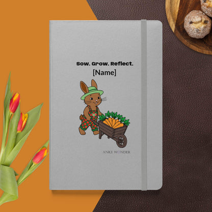 Personalized notebook with a rabbit illustration and text on a brown and orange background