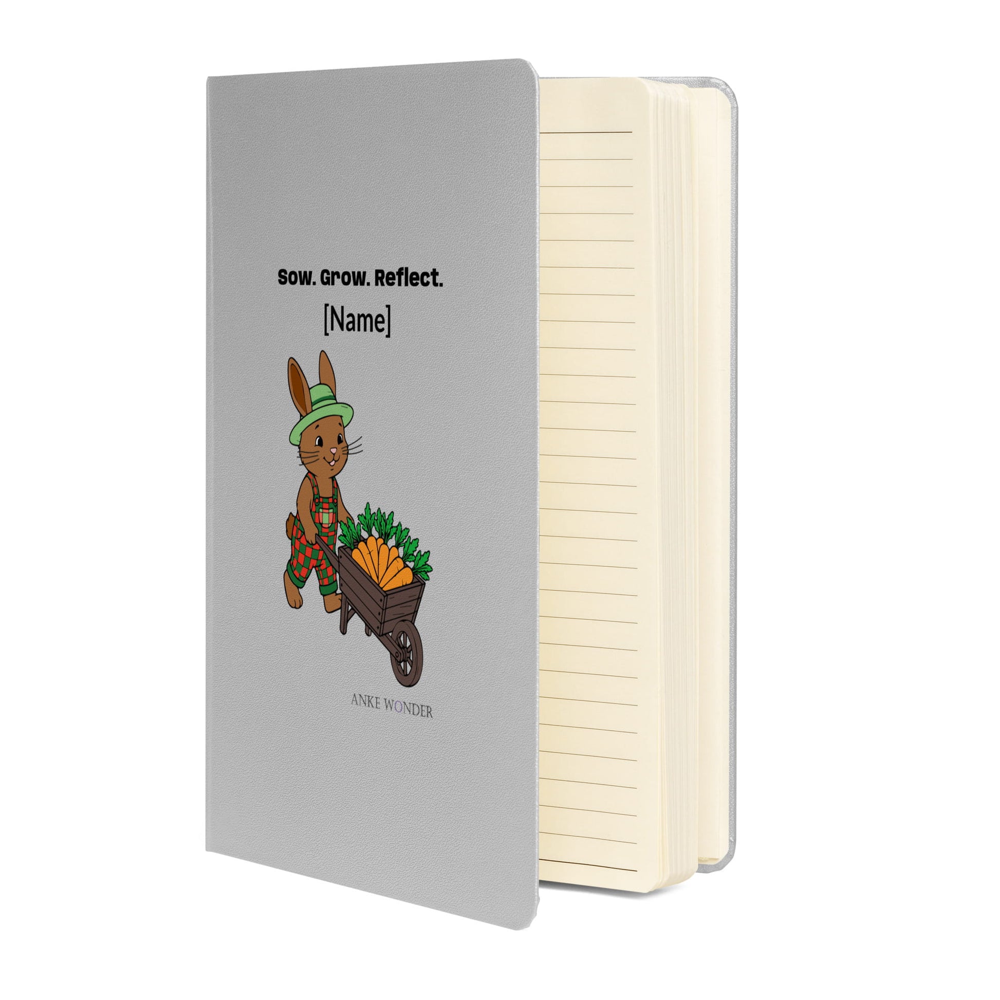 Notebook with a rabbit illustration and text 'Sow.Grow.Reflect.' on the cover, featuring the brand 'Anke Wunder'.
