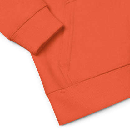 Close-up of an orange kids hoodie on a white background