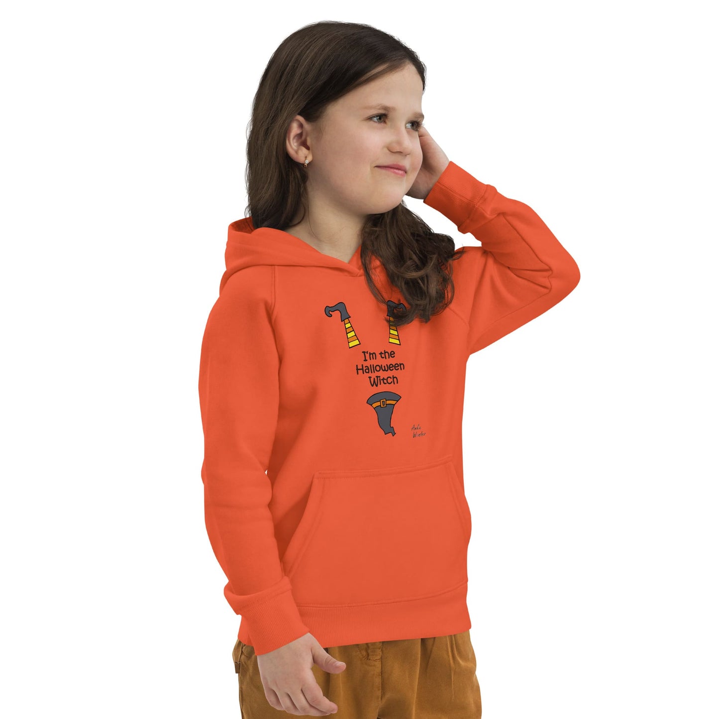 Right front view of girl wearing an orange hoodie with a Halloween design on a white background