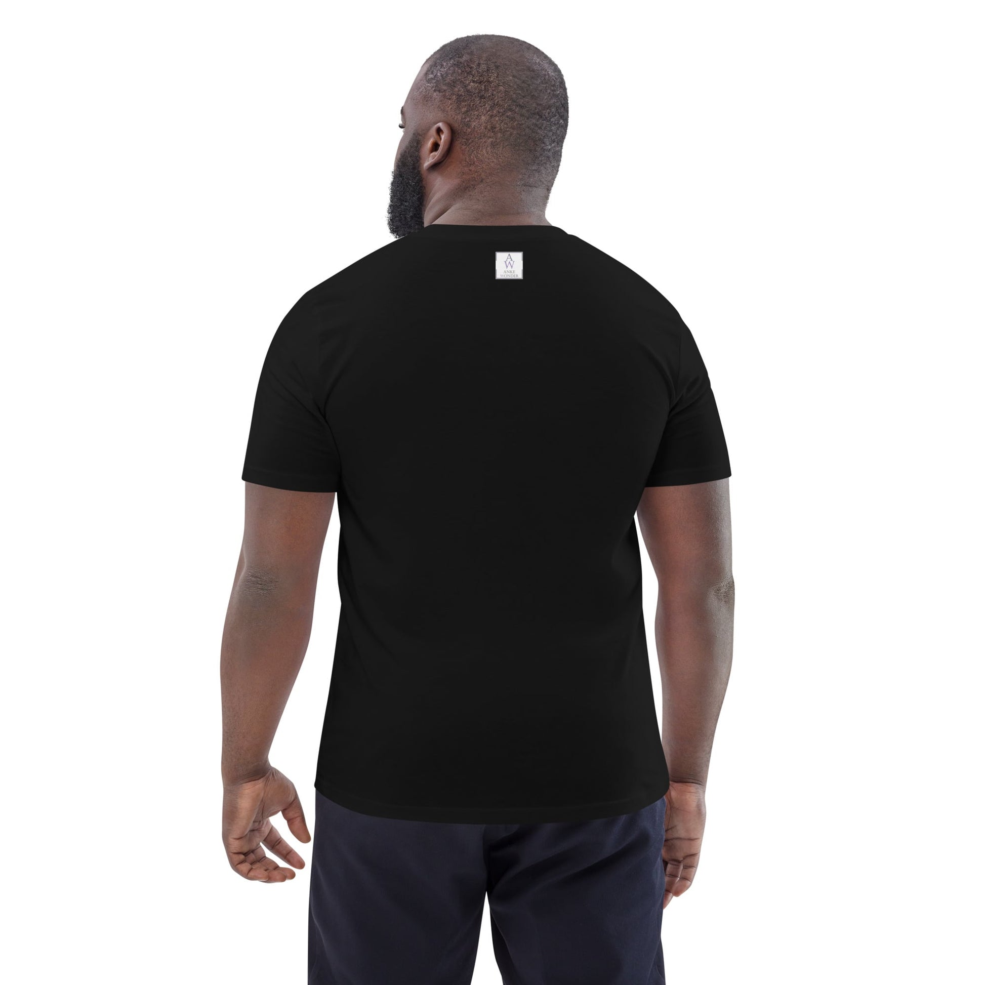Back view of men's organic cotton t-shirt in black. Minimalist, comfortable cut with clean lines with Anke Wonder branding.