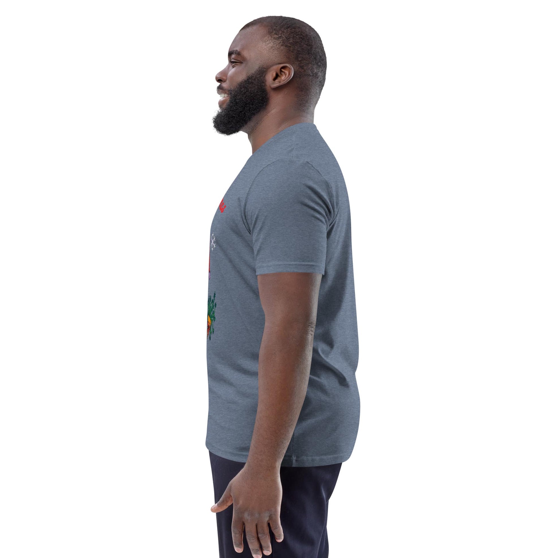 Side view of man wearing a gray t-shirt with a graphic design on a white background