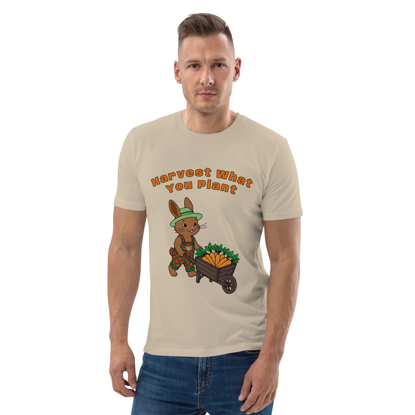 Man wearing a beige t-shirt with a cartoon rabbit and text design on a white background